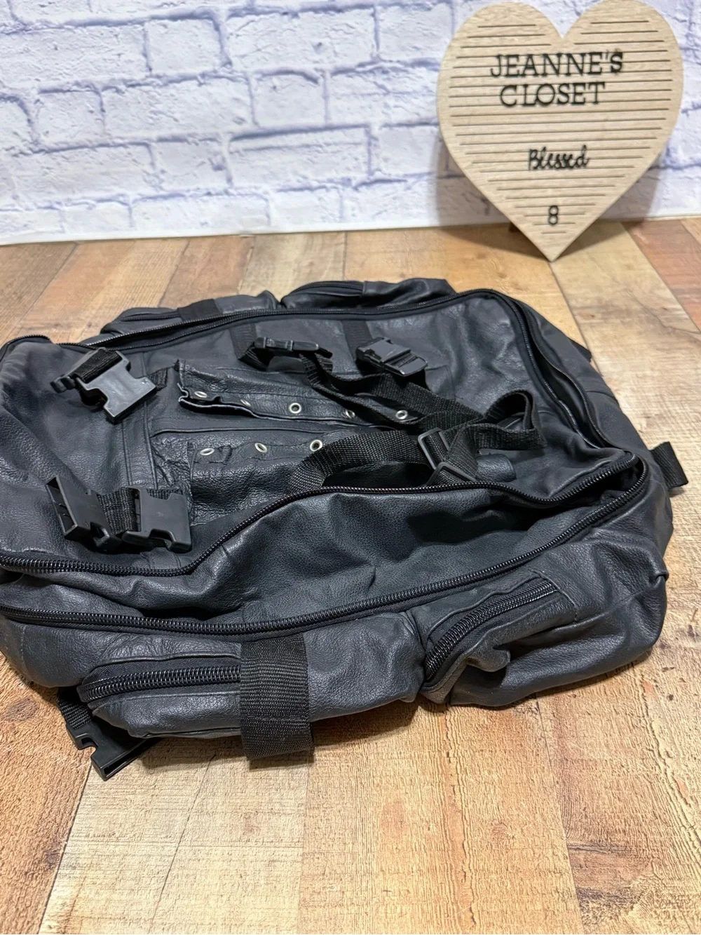 Heavy Duty Black Leather Motorcycle Backpack  Pre owned good condition.. there i